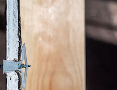 Identifying When Drywall Anchors Need Removal